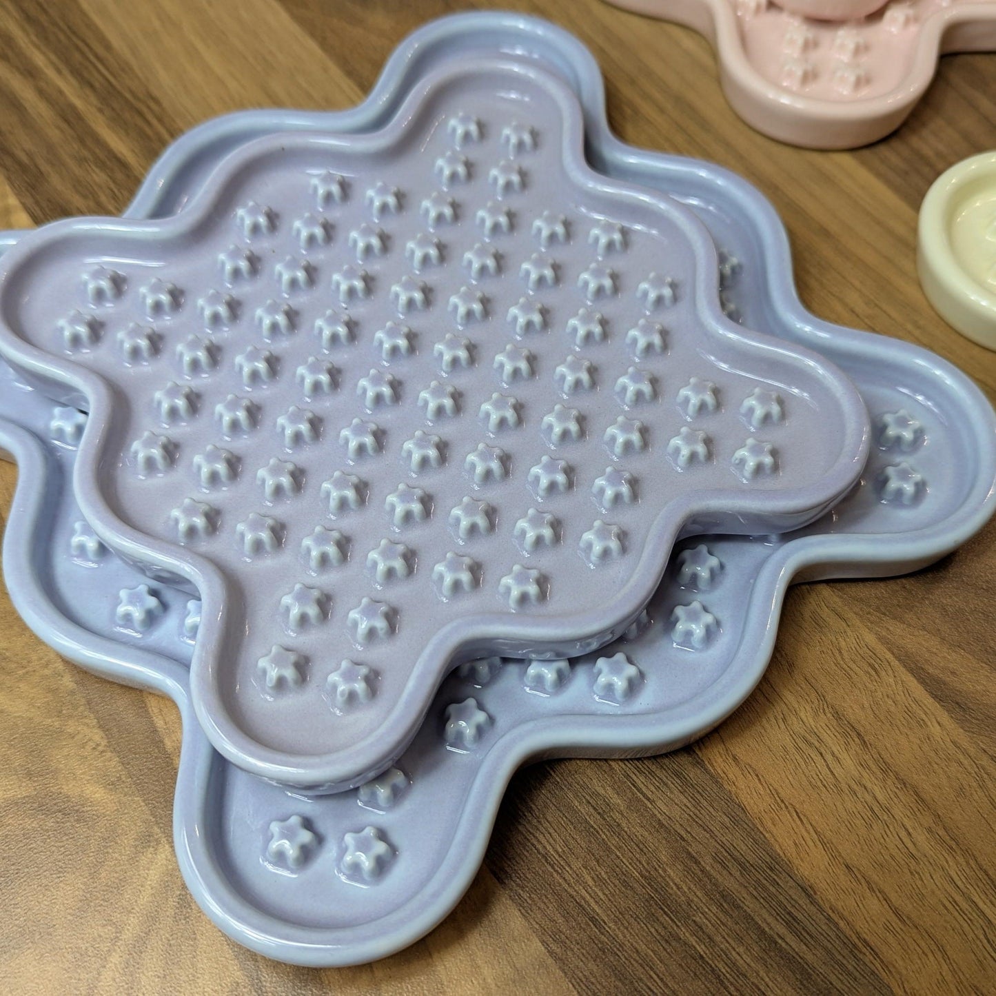 Ceramic Cat Lick Mat, a puzzle slow feeder for cats. Just like a Lickimat, but made from ceramic.