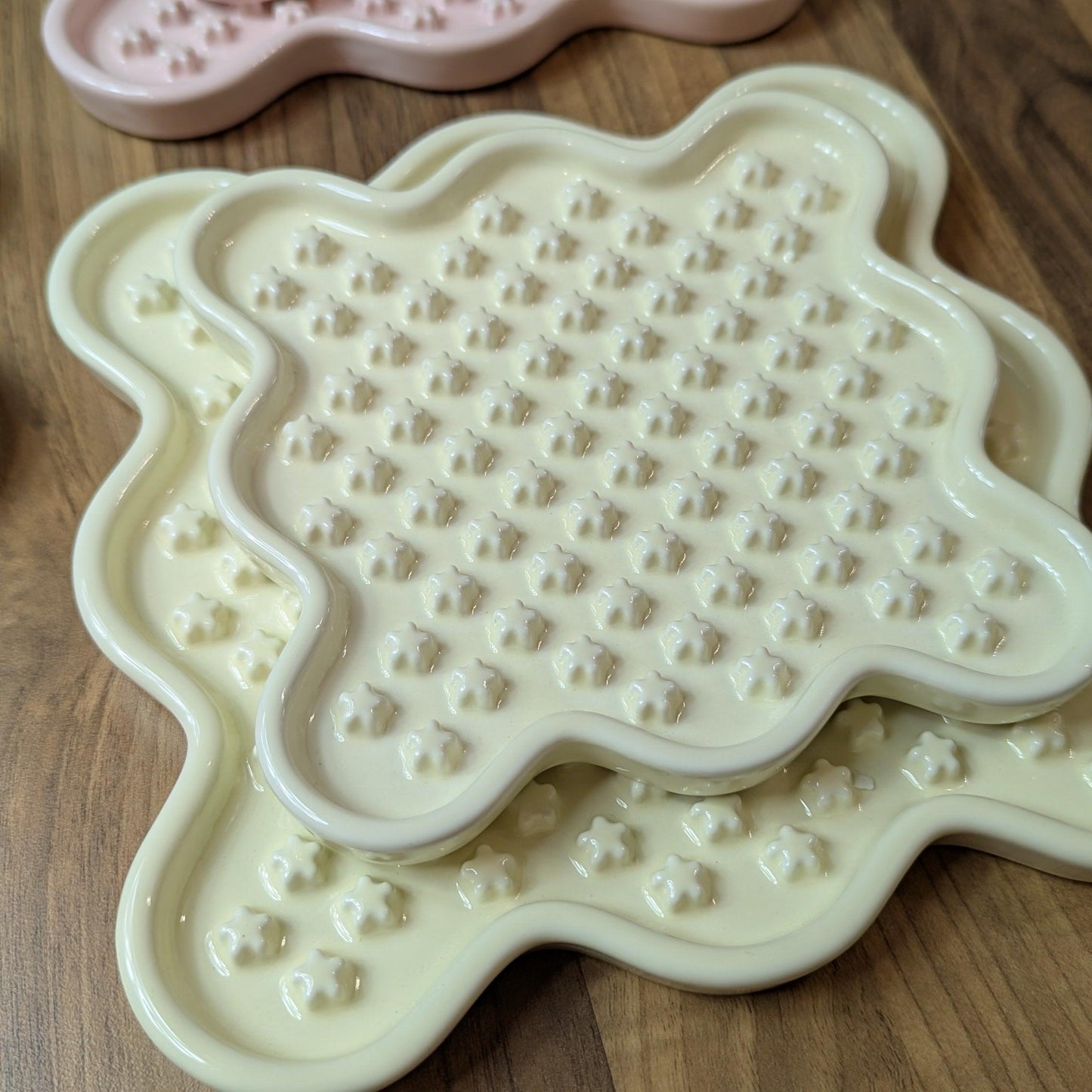 Ceramic Cat Lick Mat, a puzzle slow feeder for cats. Just like a Lickimat, but made from ceramic.