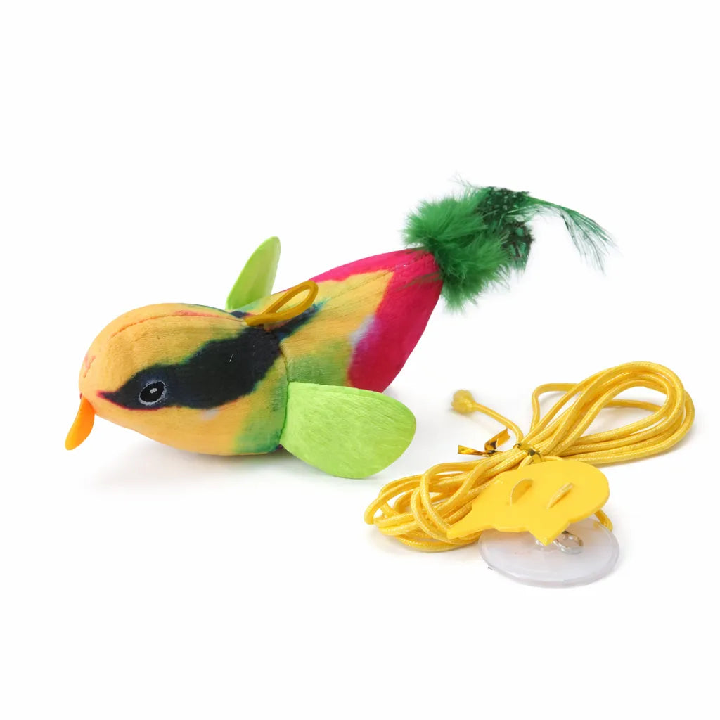 Colorful plush chirping bird cat toy with green feathers and a yellow string with a suction cup.