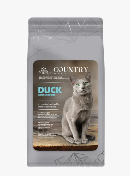 Gray cat food bag with "Country Barn Duck with Sardines" label and a Russian Blue cat.