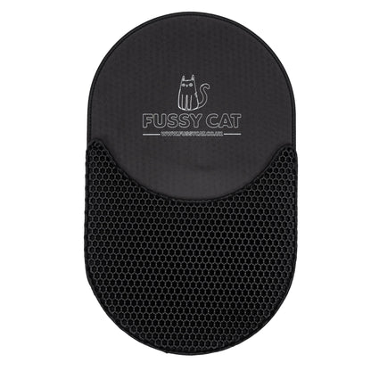 Black Fussy Cat litter mat with white logo, featuring a honeycomb texture on the lower half.
