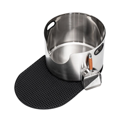 Graded Fussy Cat round stainless steel litter box with black mat and metal scoop.