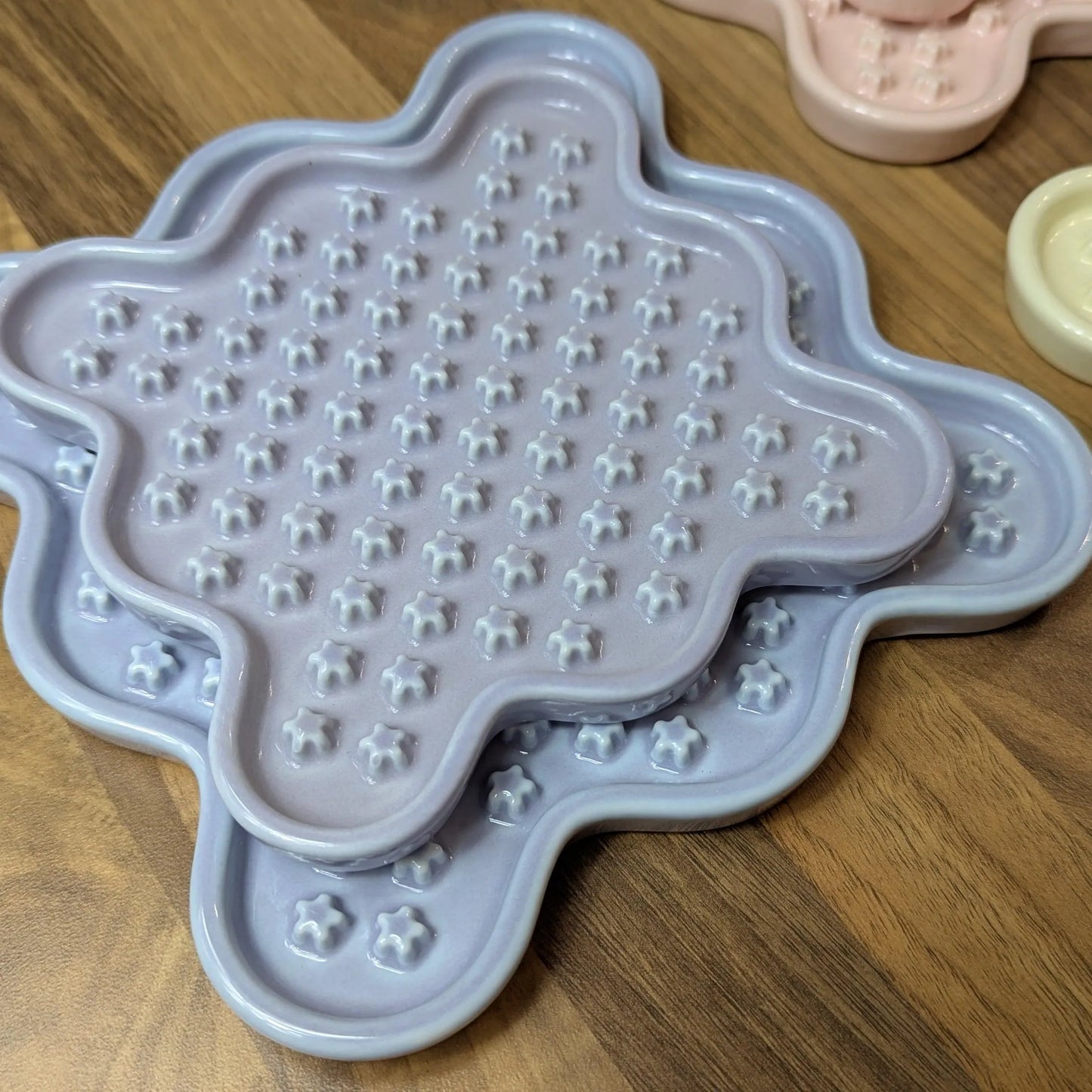 Ceramic Cat Lick Mat, a puzzle slow feeder for cats. Just like a Lickimat, but made from ceramic.