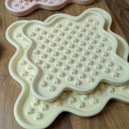 Ceramic Cat Lick Mat, a puzzle slow feeder for cats. Just like a Lickimat, but made from ceramic.