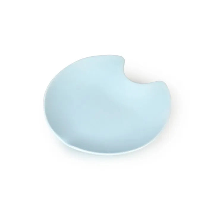 Light blue ceramic Fussy Cat water fountain with a unique, spill-resistant, curved design.