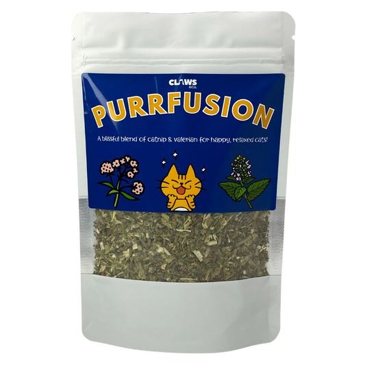 White pouch of Purrfusion catnip blend with a blue label, featuring a happy cat and plant illustrations.