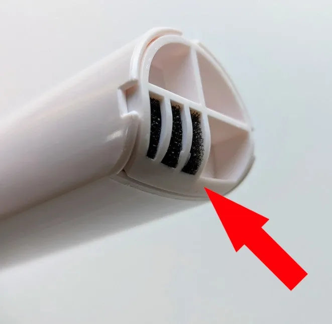 White plastic replacement debris filter holder for Fussy Cat fountain with black foam insert.