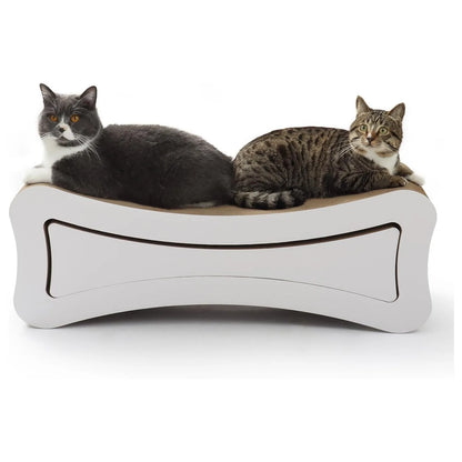 Two cats lounge on an 86cm extra-large, bone-shaped corrugated cardboard scratcher with white accents.
